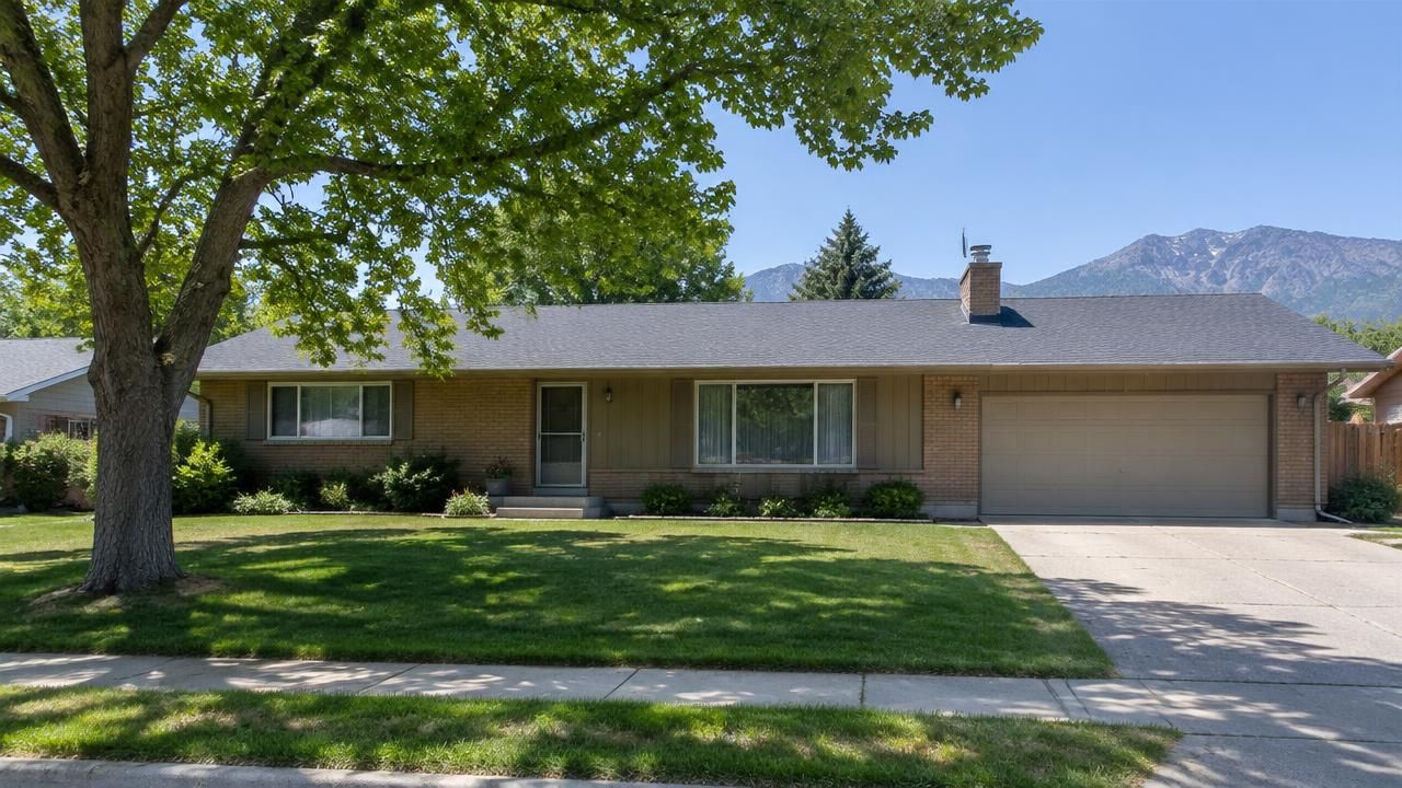 Newly replaced shingle roof on a home in Roy, Utah